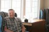 Andrew Kovacs in the waterfront lounge at the the retirement residence he has built.