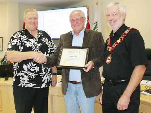 From left: Tim Burtch, Ron Lemke and Mayor Ron Higgins. 