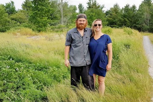 Sarah and Rob Winney by the potato patch