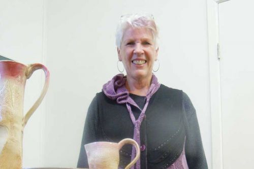 Fallbrook potter Jane Conley and some of her ceramic work at the MERA Christmas Fair in McDonalds Corners   