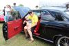 Jack Bowes and grandson Boyce Bowes are all smiles in Jack’s one-of-a-kind Beaumont two-door hardtop.