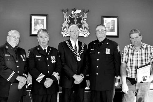 Captains Rick Nelson and Brian McCarthy were both on hand to receive their 30-year pins, and firefighter Mike Noonan received his 25-year pin.