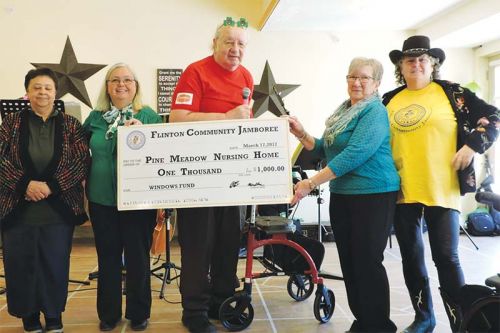 (L to R) Karen Anderson, Flinton Jamboree (FJ) Registration Coordinator, Margaret Palimaka, Administrator of Pine Meadow, Bob Taylor, FJ President, Betty