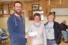 Rob Moore, who headed up the talent show at this year&#039;s FHF talent show, along with FHF chair Janet Gutowski present a cheque to Kim Cucoch, chair of the North Frontenac Food Bank.