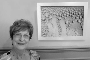 Louise Day with her work titled “Bubbles on the Window” at the Grace Centre in Sydenham until September 22