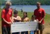 Swimming Lessons Supervisor Cole Bolton, swimmers Aidan Brough , Avery and Julia Cuddy and Swim Instructor Jared Salmond accepting a cheque from the Flinton Recreation Club. In addition to their sponsorship, the Flinton Recreation Club donated the $1000 proceeds from one of the 50/50 draws at the Flinton Jamboree to swimming lessons.