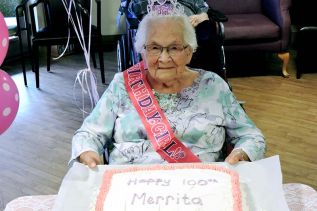 Merrita with a cake befitting the occasion