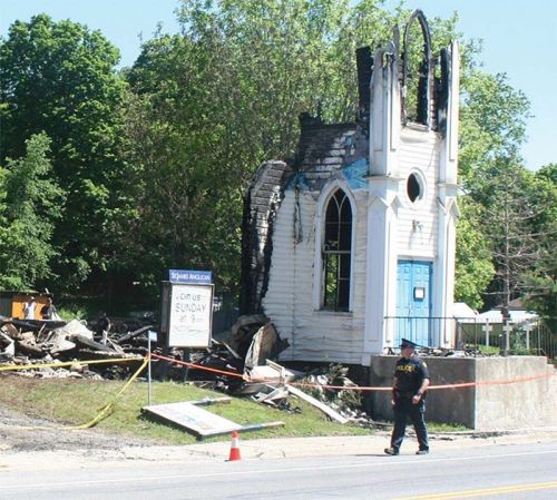 St. James Church after the fire, one year ago; file photo
