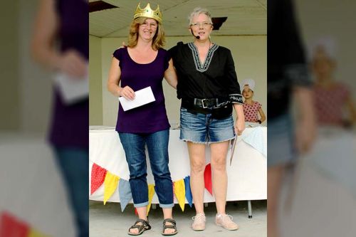 Tanya Labelle (l) took top honours at the Sharbot Lake Farmers Market Butter Tart Challenge last Saturday and received a cheque for $50 from organizer Andrea Duggan. Photo/Craig Bakay