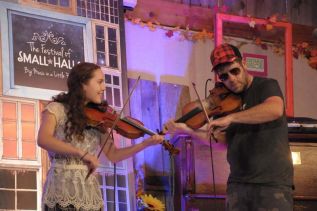 Fidlders Jessica Wedden and Ashley MacIsaac playing 'Whiskey Before Breakfast '