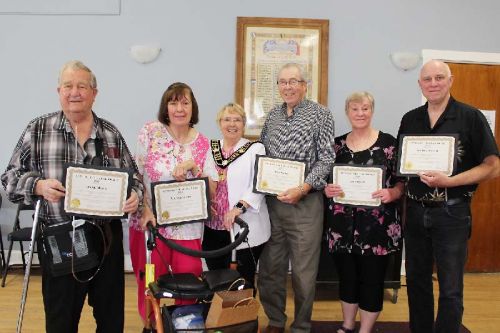 Central Frontenac’s Seniors of the Year, from left: Archie and Marilyn Meeks, Mayor Frances Smith, Dave Swann, Joan Wyatt and Jim MacPherson. Photo/Craig Bakay