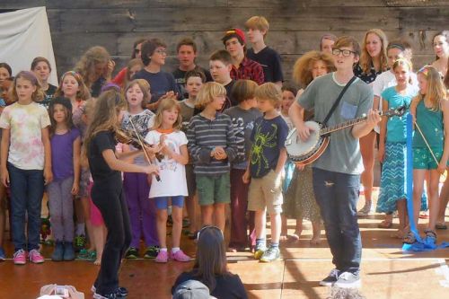 The Blue Skies camper choir performed with fiddle player Jessica Wedden and Kieran L'Abbe at their final Showcase on July 26