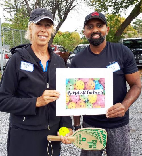 Cheryl Mitchell and Niro Mahan, winners of Saturday’s pickleball tournament.