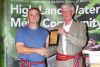 The Ontario Trillium Foundation’s Jim Roulston presents High Land Waters Metis Community President Scott Lloyd with a plaque signifying a $75,000 seed grant awarded to the Community for its Mamawapowuk traditional knowledge project. Photo/Craig Bakay