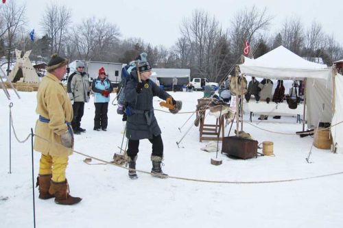 Mike Procter giving tomahawk lessons at a recent winter camp