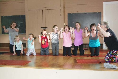 Instructor Jackie Adams (right) leads her students through an exercise at Bellrock Hall. Photo/Craig Bakay