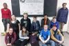 Students from the School to Community class at Granite Ridge Education Centre (GREC) in Sharbot Lake posing in front of a Spread the Word to End the Word poster that was signed by Granite Ridge students and staff.