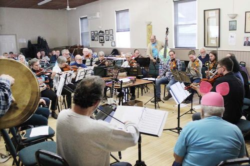 There is no definitive word for a number of fiddles although online sources suggest either a 'quora' or an 'ensemble'. We prefer to call it a 'festivity of fiddles'.