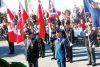 Wreath laying ceremony in Sharbot Lake as th colour guard stands watch