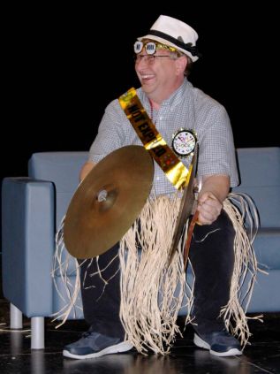 They even put Mr. McVety to work at his own retirement party, playing the cymbals while Dave Gervais and Nicole Kasserra led the crowd in a rousing rendition of The Boxer. Photo/Craig Bakay