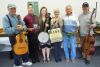 l-r Dave Dawson, Mitch Barker, Brittany Bain, Joan and Roy Shepherd and Tom Revell at the Bedford Music swap and jam at Bedford Hall on May 31