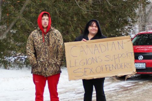 Members of Kingston Creep Watchers protested at the Sharbot Lake Legion Sunday. 