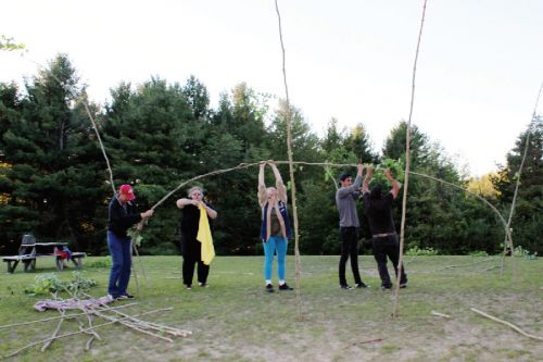 Christina Bendevis, Danka Brewer, Leta Waite, Jordan Mackinaw and Ross Saunders begin framing the new wigwam at St. James Major School in Sharbot Lake. Photo/Craig Bakay