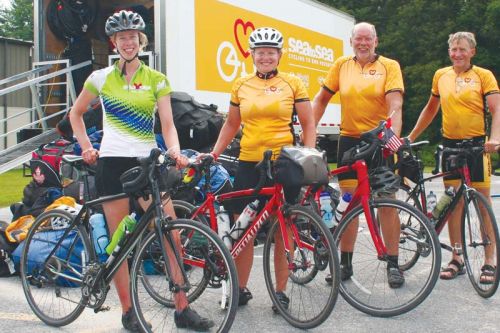 Sea to Sea riders at Frontenac Arena Deanna Bulsink from Edmonton, Anita Kralt from Bowmanville, Jim Haveman from Grand Rapids, Michigan and Andrew Ponsen from Burlington.