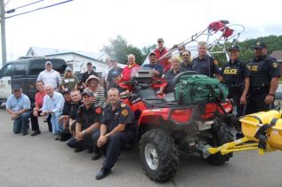 Representatives from various emergency and other service groups in North Frontenac at the Essential Services Fair in Cloyne on July 26