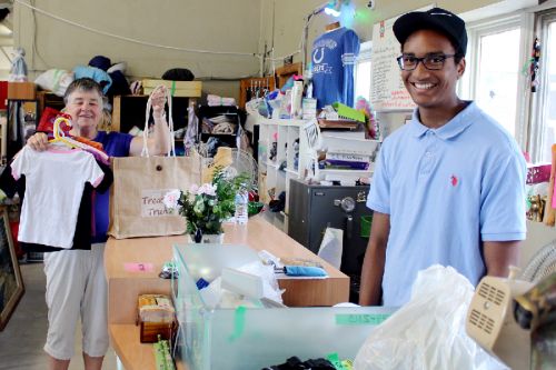 Caden Stephenson rings up Lillian Shepperd’s purchases at The Treasure Trunk. Photo/Craig Bakay