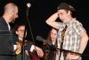 Zach Teal receives his trophy for winning Frontenac’s Got Talent from emcee Rob Moore last Friday night in Sharbot Lake. Photo/Craig Bakay