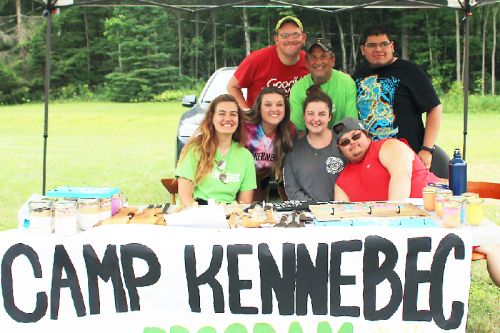 One of the more enthusiastic booths at the Arden Seniors sale/barbecue Saturday was the Camp Kennebec Independence Team. Pictured are Matthew Palmer, Camryn Forrester, Becca Delaney, Lauren Logie, Sam Ireland, Alex Olynyk and Jay Aber. Photo/Craig Bakay