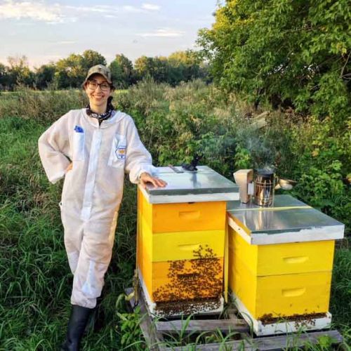 Alexandra Pederson with her hives