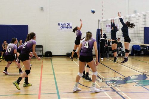 The St. Mary CHS Crusaders defeated the L’Heritage Dragons in the EOSSAA A senior girls volleyball final last week at GREC. Photo/Craig Bakay