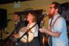 2908-The Once, l-r, Andrew, Geraldine Hollett and Phil Churchill pumped up the capacity crowd on March 16 at Sharbot Lake&#039;s Crossing Pub