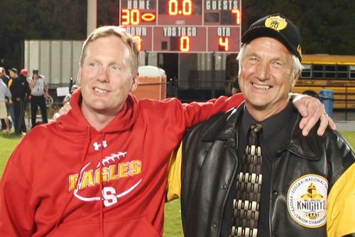 Karl Hammer IV (left) coach of the junior Golden Eagles, defeated his father, Karl Hammer III, in the Bubba Bowl. When asked, the younger Hammer said: “Nah, I don’t think it’ll cause any friction at the Thanksgiving dinner table.”