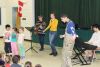 Astrid Tanton delighted the Prince Charles Public School crowd by inviting several of them to come up and dance while she and the band played last week in Verona. Photo/Craig Bakay