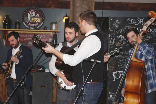 The Slocan Ramblers, Adrian Gross on mandolin, Frank Evans on banjo, Darryl Poulsen on guitar and Alastair Whitehead on bass, rocked The Crossing Pub on Saturday in night in Sharbot Lake. Photo/Craig Bakay