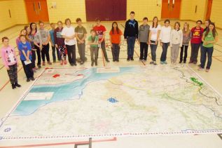 r. Hull's grade 7/8 class at LOLPS learn about population impacts resulting from WW1 with one of Canadian Geographic's huge interactive floor maps