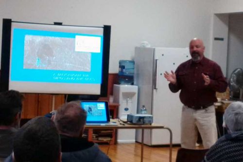 Kyle Breault, involved in tallgrass planting projects throughout Ontario,  speaks to a crowd at the Wolfe Island United Churach as part of the Frontenac Stewardship Foundation's 2015 seminar series.