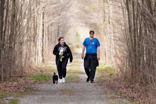 FRONTENAC, Ont. (17/04/2021) - Emily Bureau and friend Jeffrey Ray from Kingston are discovering the Cataraqui Trail on April 17. “We’ve tried a couple different trails but we’re still discovering,” says Bureau. This time of year is great to see nature coming back to life with flowers popping up and birds singing. Photo by Daniel Geleyn