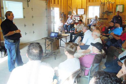 Bev Campbell of Lapierre Equipment speaking at Mel and Joyce Conboy's farm in Shabot Lake as part of the OMSPA's Fall Maple Field Day event