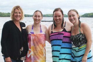 Filling in for the Mayor, Coun. Sherry Whan welcomed the Procter sisters to Oso Beach following their annual swim to raise funds for cancer research.