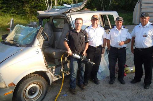 l-r volunteer fire fighter Spencer Robinson, Sharbot Lake Station Chief Bill Young Jr., Deputy Fire Chief Bill Young and Deputy Fire Chief Art Cowdy