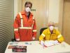 Firefighters Geoff Culp and Marc Guilbault screened everyone coming into the North Frontenac Council meeting last Friday. Robert Rutherford worked the door. Photo/Craig Bakay